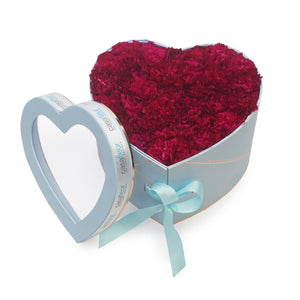 carnations in a heart shaped container